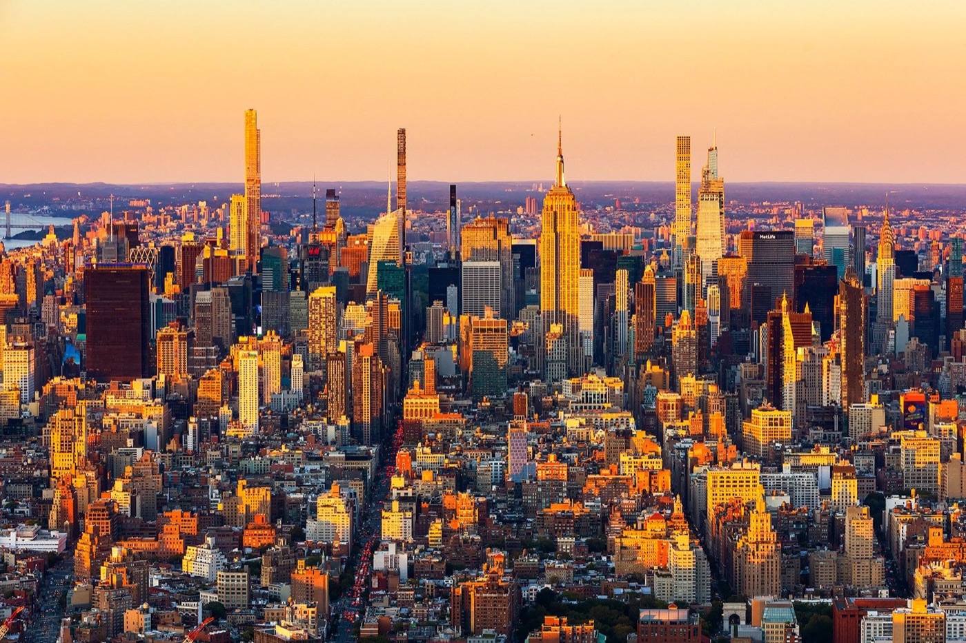 Manhattan at golden hour, the Empire State Building at centre