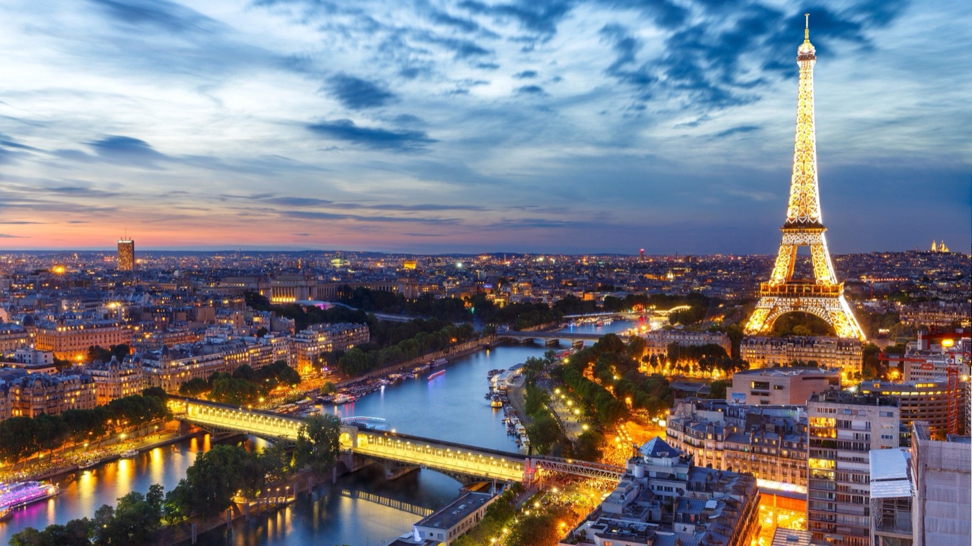 Paris at dusk, the Seine and the Eiffel Tower lit
